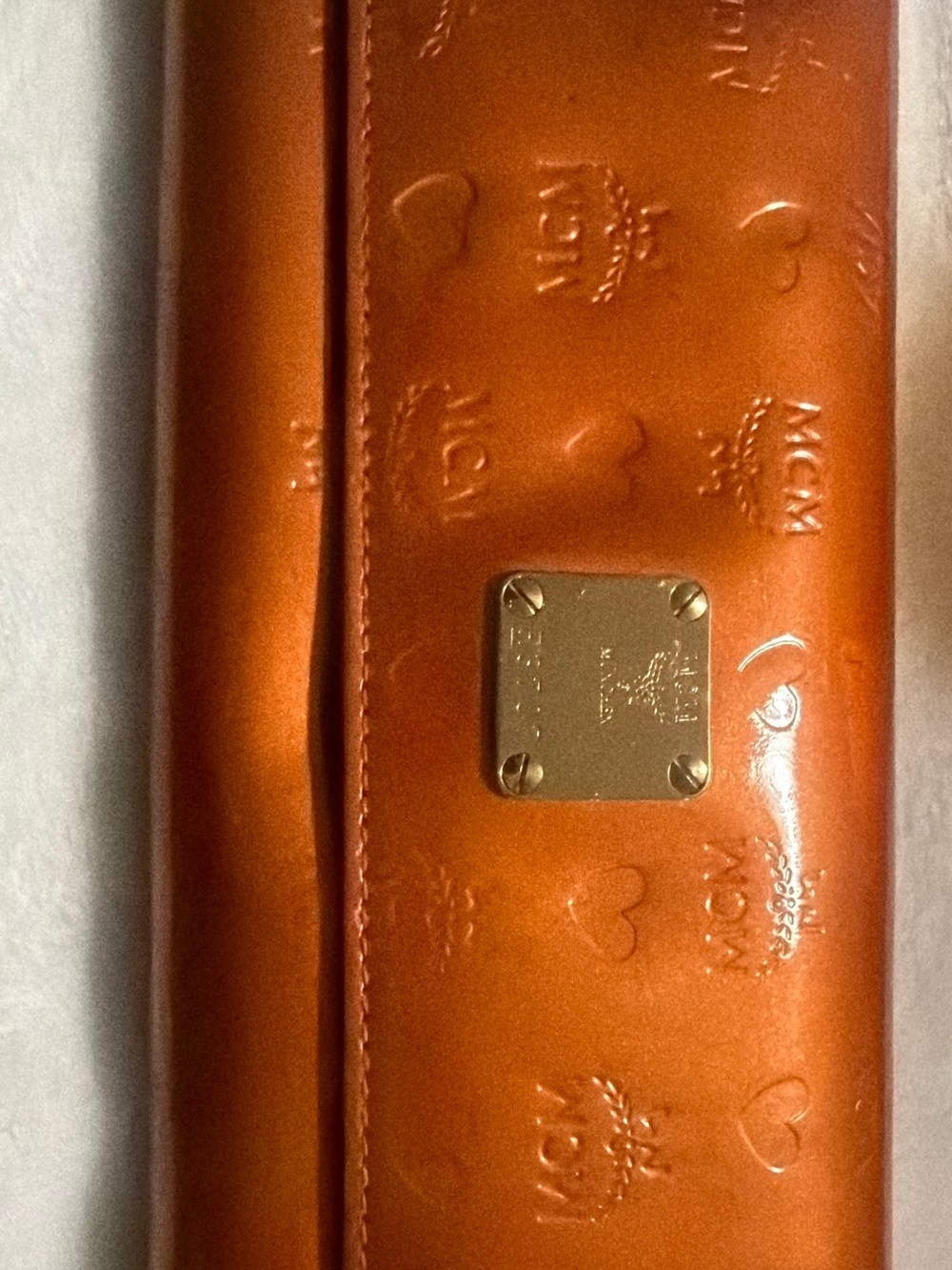 MCM Embossed Wallet Orange with Gold Plate